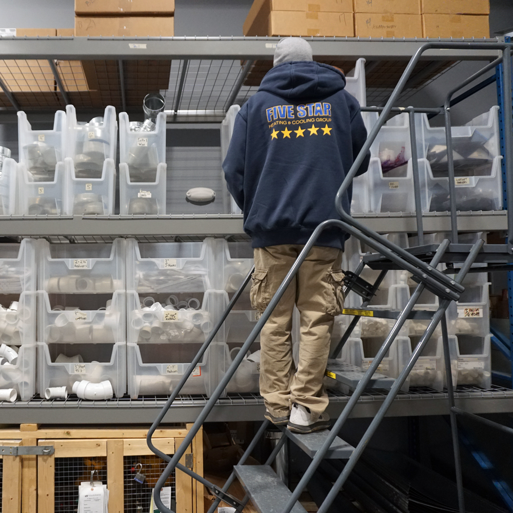 employee-on-ladder